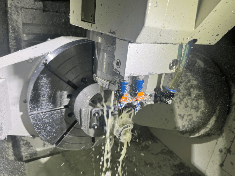 5-axis CNC machining a complex metal prototype from solid stock
