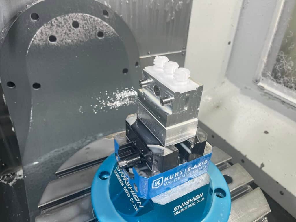 CNC milling POM plastic with single flute end mill to prevent heat buildup and warping.