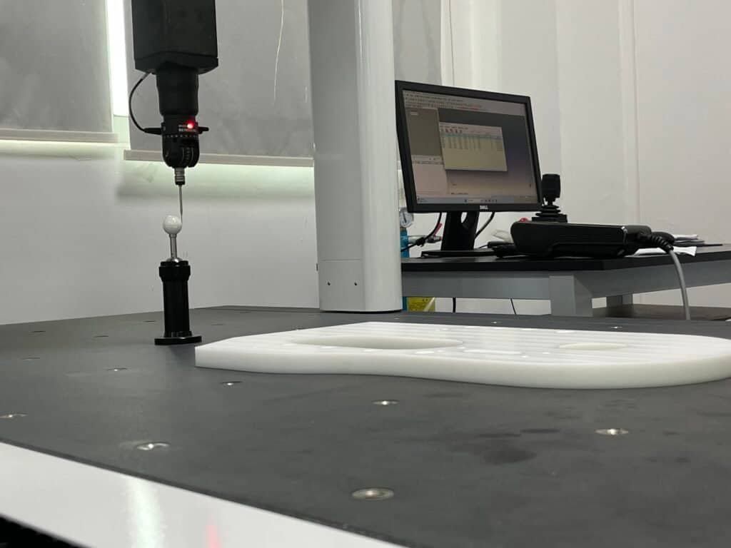 High-precision 5-axis machined component passing quality inspection at Samshion Rapid.