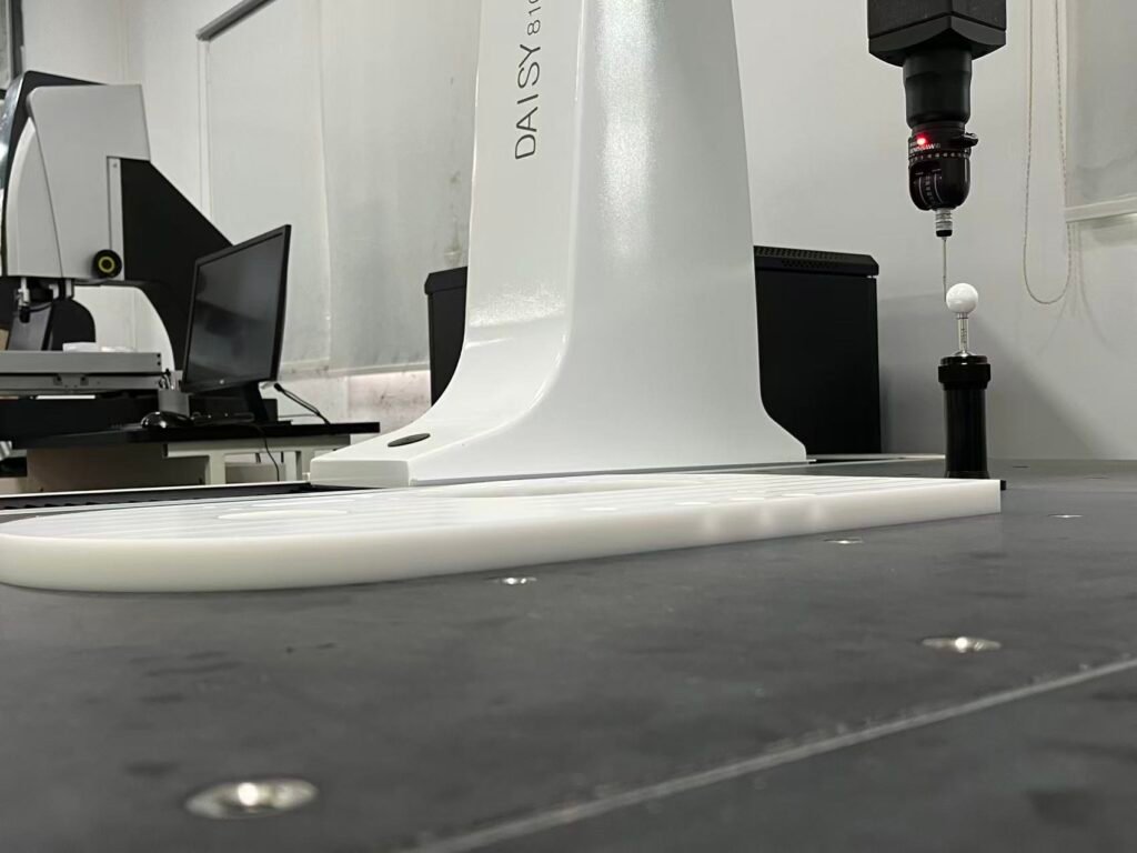 Precision machined PA66 gear prototype checked for dimensional accuracy after moisture conditioning.