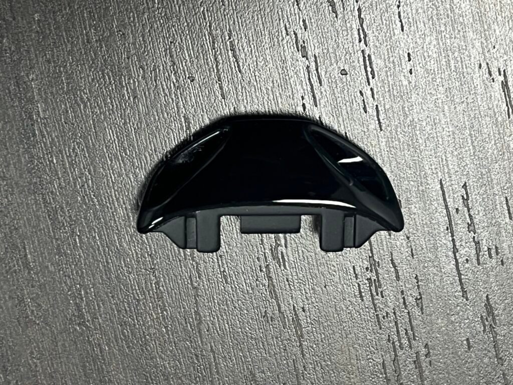 Quality control inspection of machined cast iron part verifying dimensional accuracy.