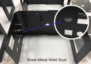 Black powder-coated sheet metal enclosure with welded studs and defect comparison coupons