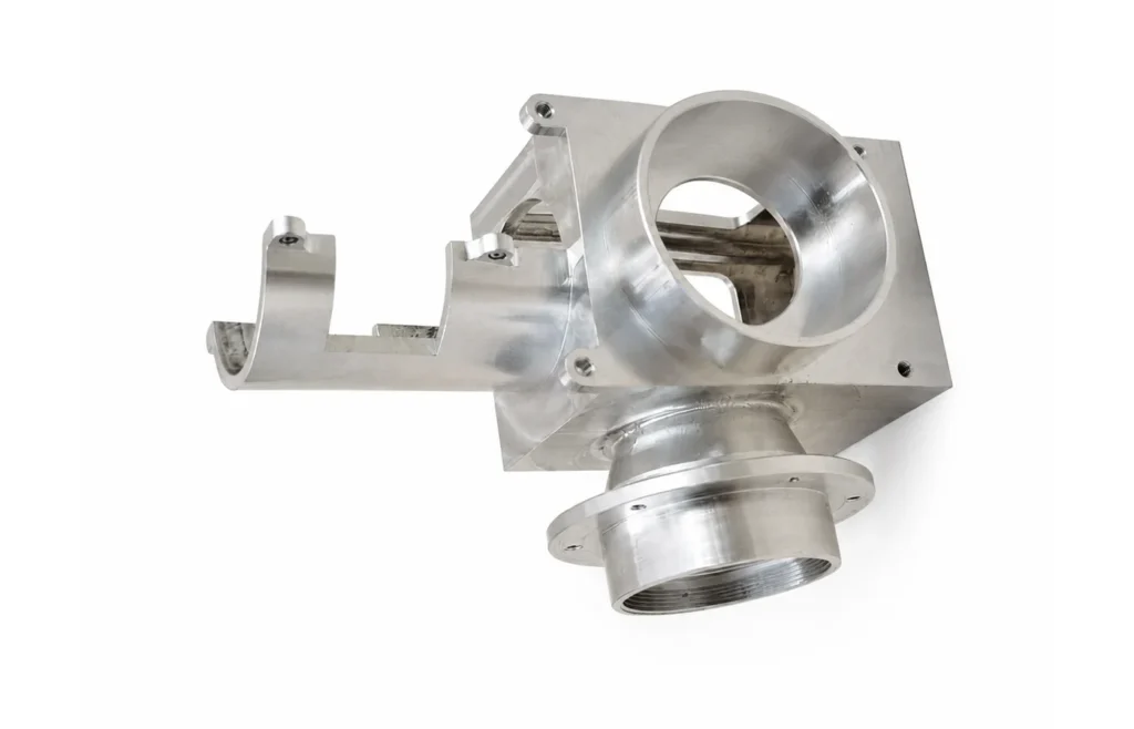 6061 aluminum CNC machined component with multi-directional bores and complex geometry
