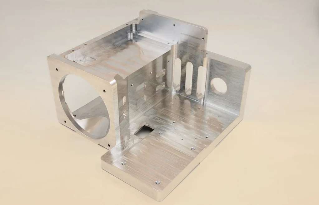 One-piece 6061-T6 optical component with multi-angle features and deep slots produced by 5-axis CNC machining