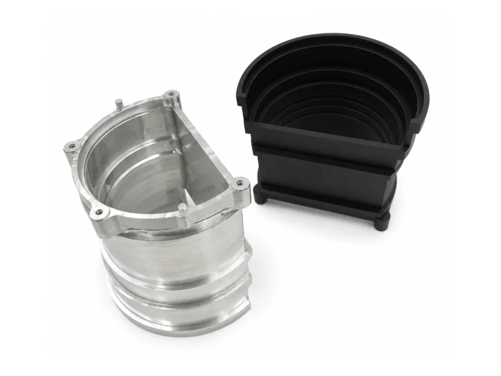 6061-T6 aluminum optical lens barrel shown in as-machined and black anodized finishes