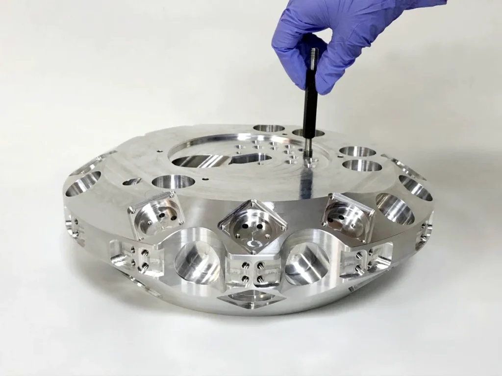 Feature-specific tolerance inspection of a complex CNC machined aluminum part