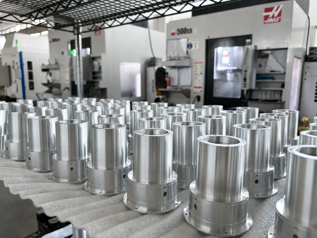 Batch of CNC machined aluminum parts in the SAMSHION production workshop