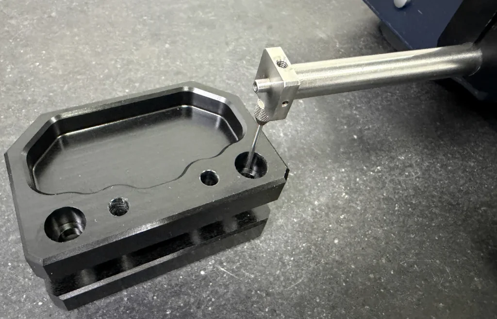 Inspection of counterbore depth and spotface seating surface on a CNC machined part