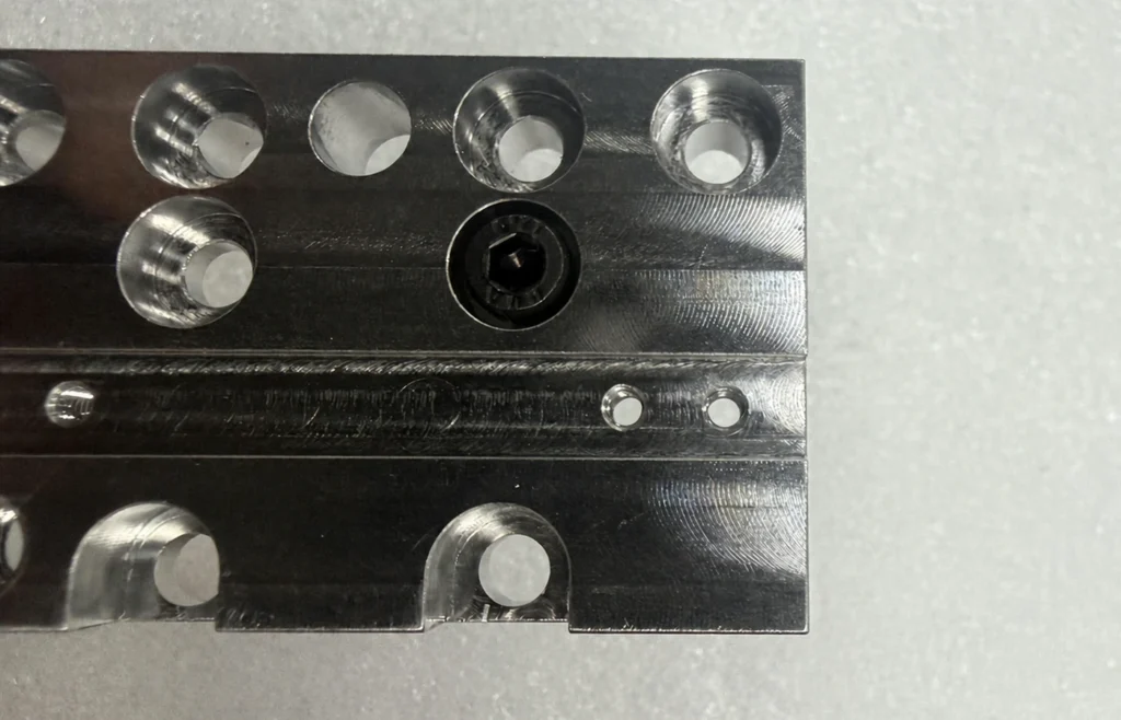 Socket head fastener seated in a CNC machined counterbore