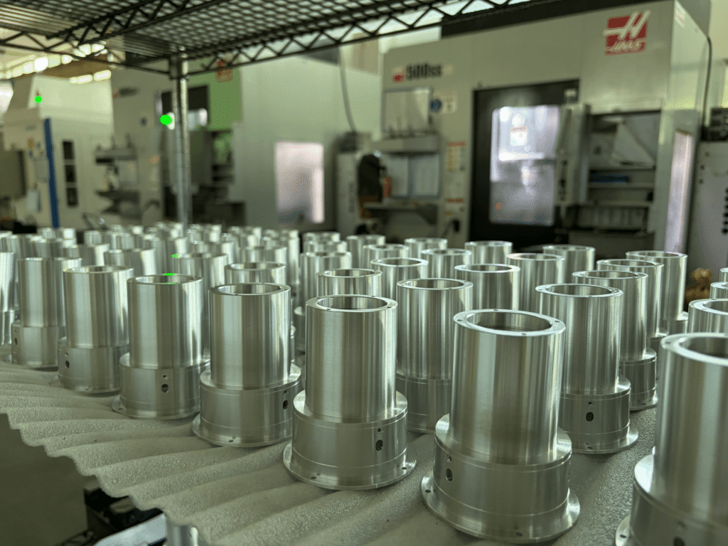 Custom CNC turned shafts, bushings, pins and threaded fittings