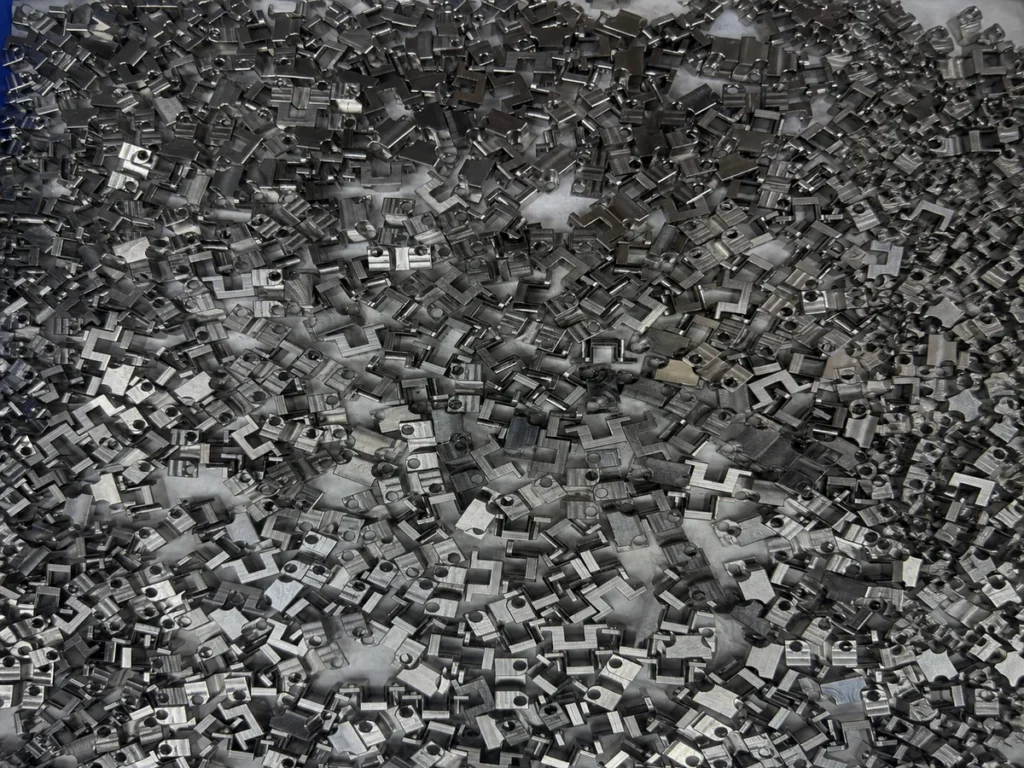 Large repeat-production batch of small CNC-machined metal components
