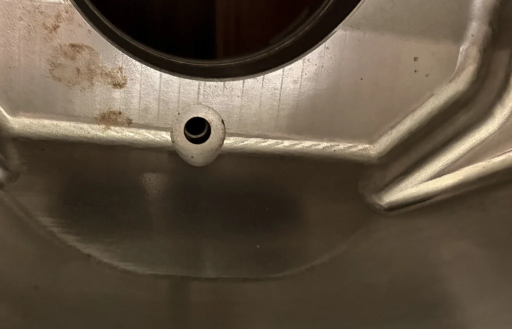 CNC spotface machined on a curved or uneven component surface