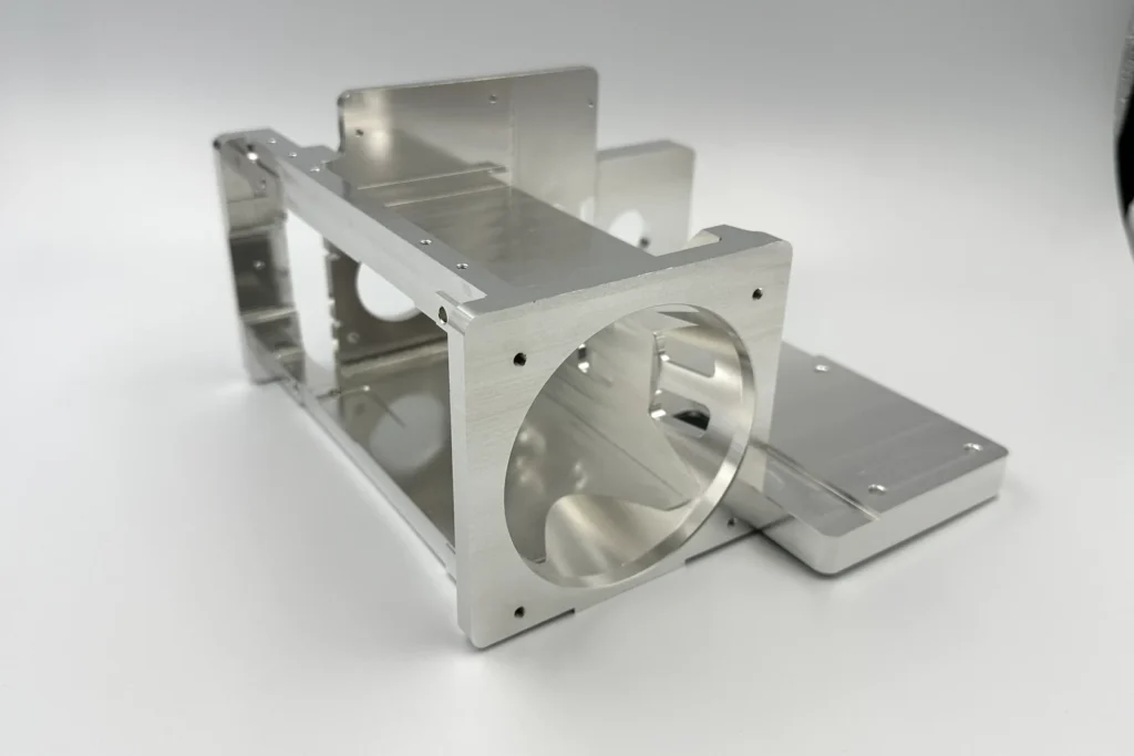 6061-T6 aluminum bracket with large bores and mounting faces for infrared equipment