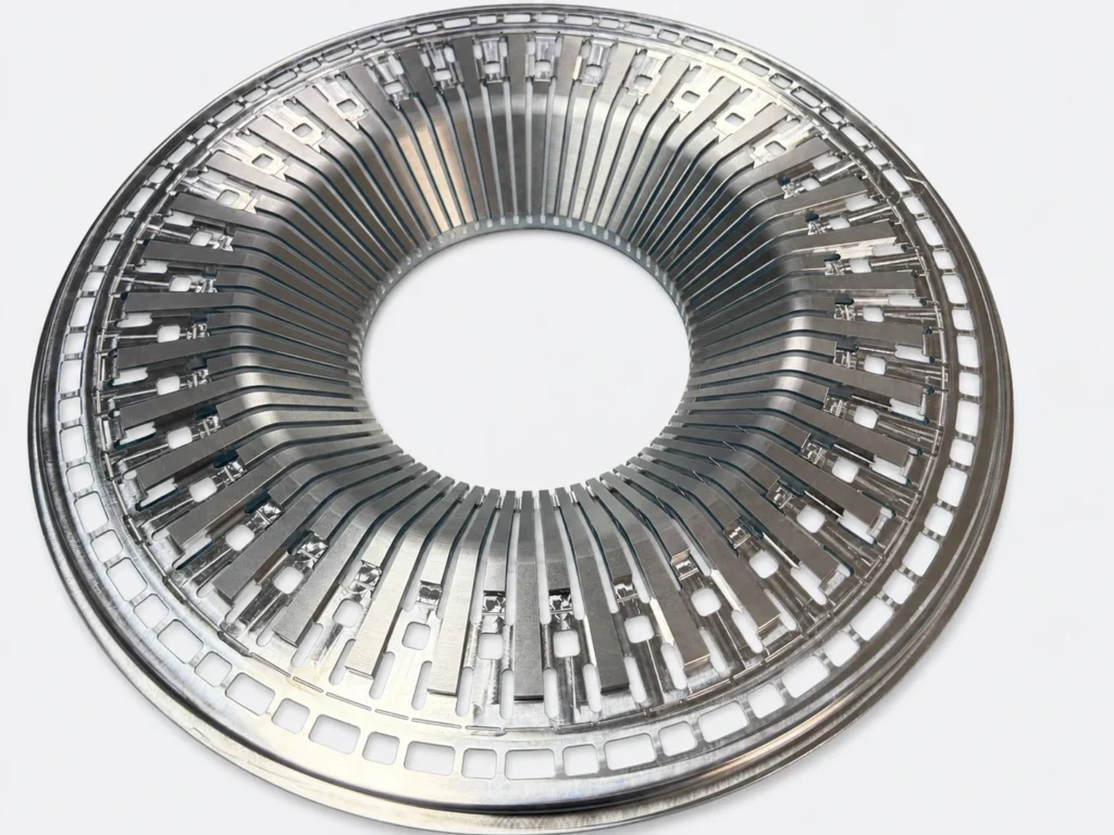 CNC-machined aluminum ring with closely spaced slots and thin radial ribs