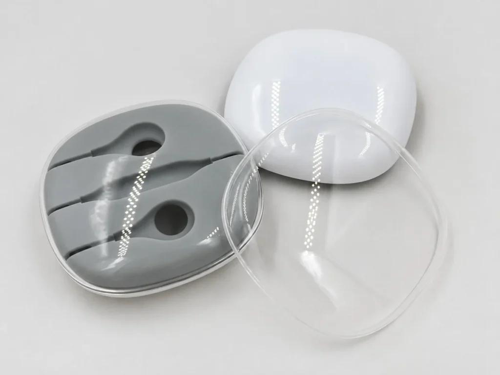 Polished clear PMMA cover with a white ABS headphone case housing and gray soft insert