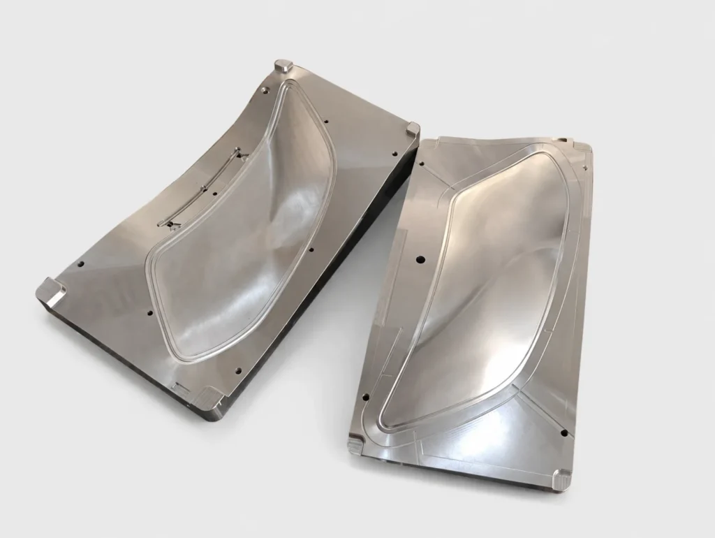 Two injection mold components for a transparent PC automotive lamp cover
