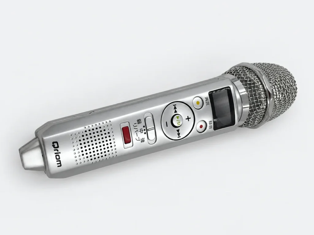 Microphone prototype with a silver-painted ABS housing, screen-printed controls, display window and mesh grille.