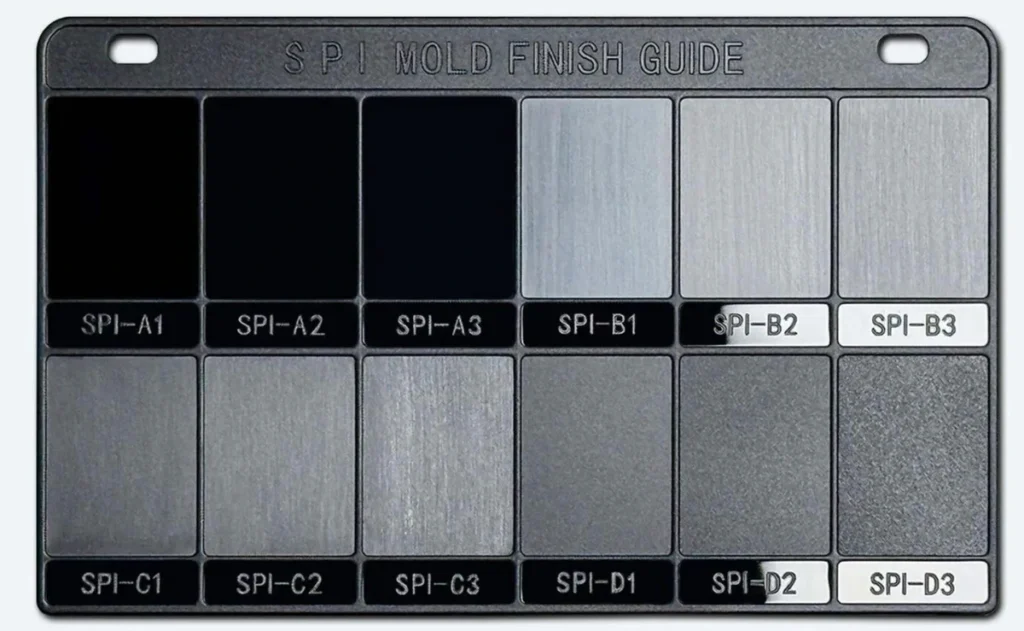 SPI mold finish sample plaque showing grades A1–A3, B1–B3, C1–C3 and D1–D3.