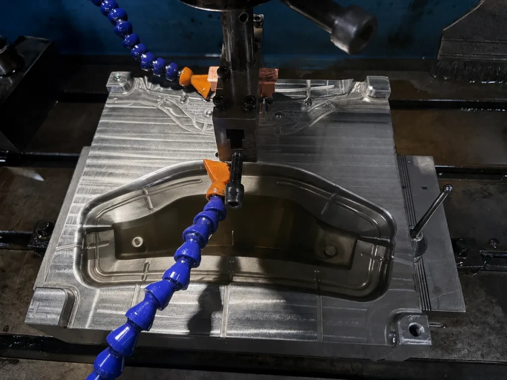 EDM machining of a steel rapid tooling mold cavity at the SAMSHION factory.