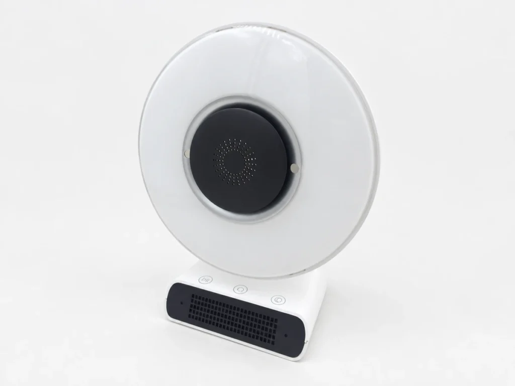 Bluetooth speaker prototype with a translucent white painted PMMA panel and painted ABS components
